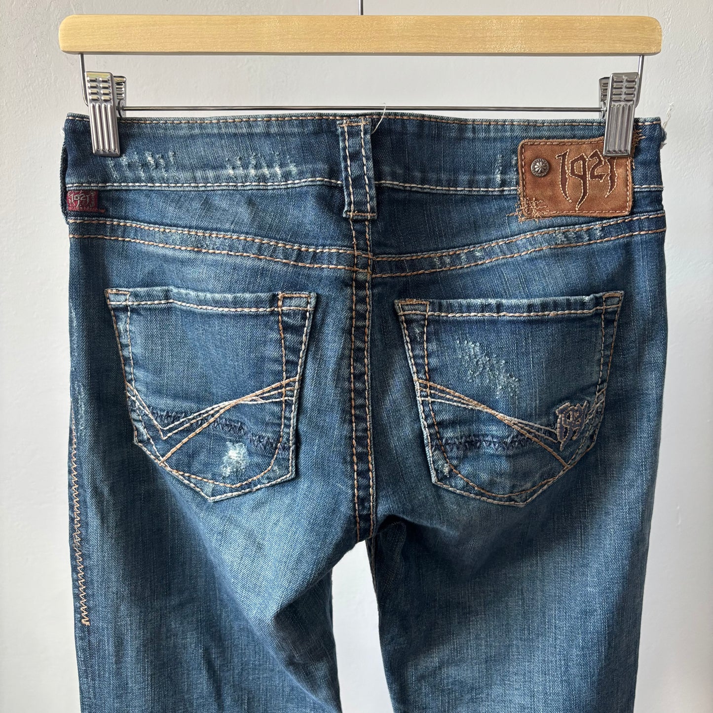 1921 Low Rise Bootcut Distressed Jeans