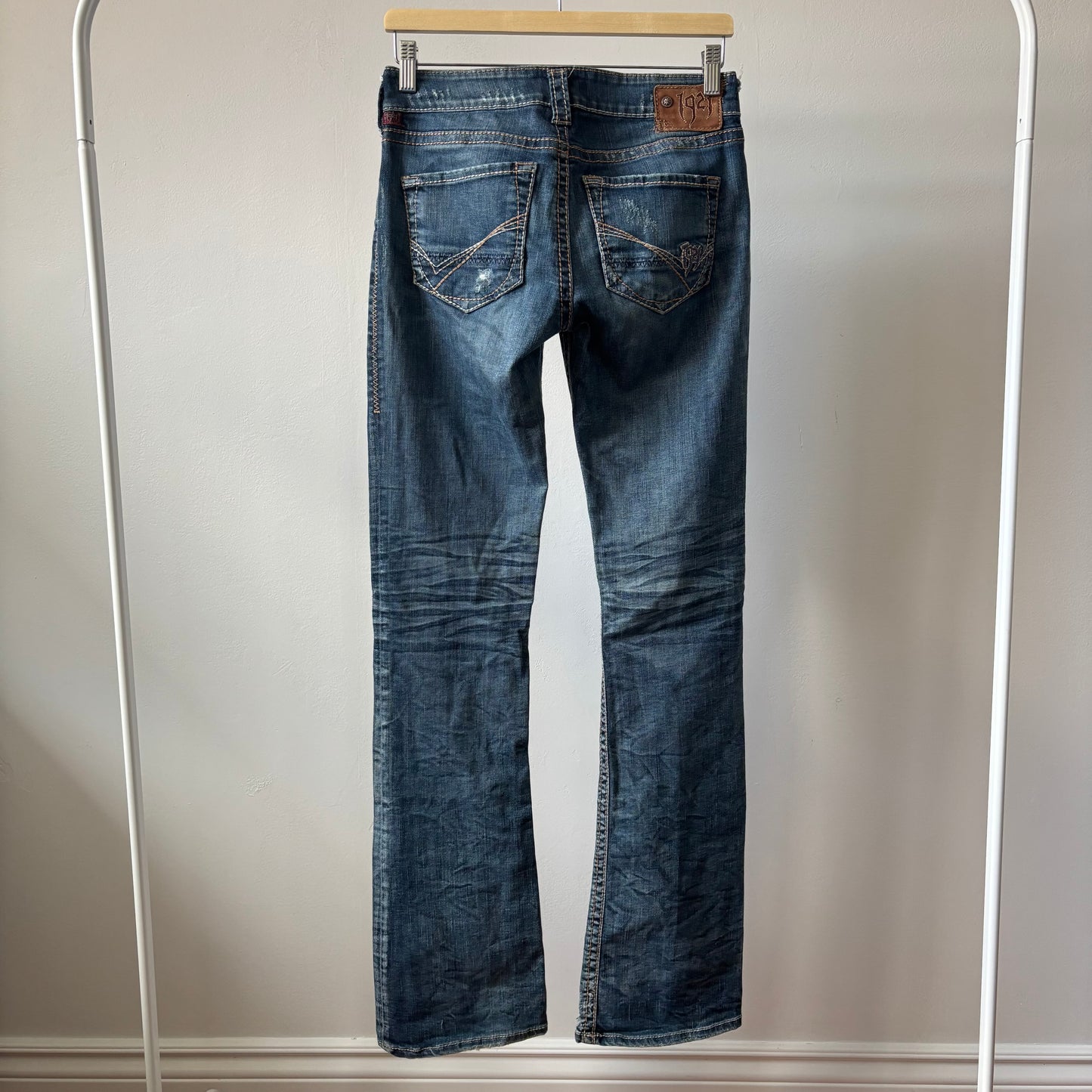 1921 Low Rise Bootcut Distressed Jeans