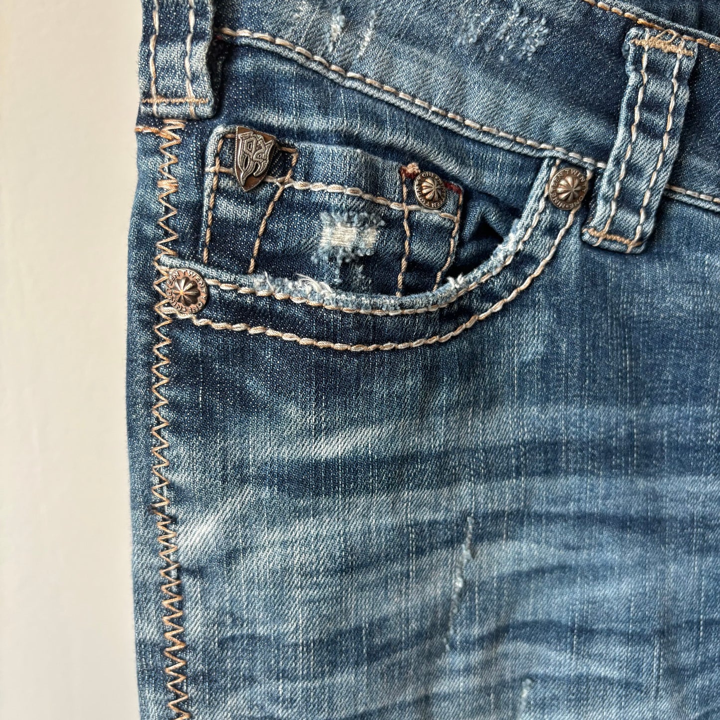 1921 Low Rise Bootcut Distressed Jeans